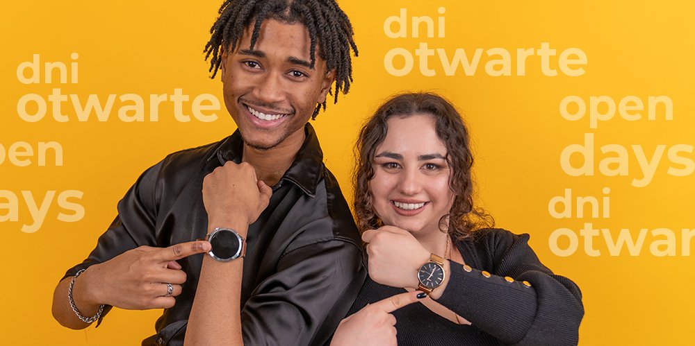 students on yellow background pointing to their watches