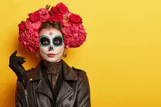 An actress, or perhaps a cosplayer, in a leather jacket, gloves, with flowery hair, and vibrant theatrical makeup. What creative person hides behind this mask and in which profession will she excel? Fill out the survey - match studies to yourself!